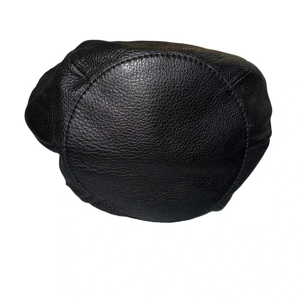 The Sak Indio black leather hobo bag, braided shoulder straps